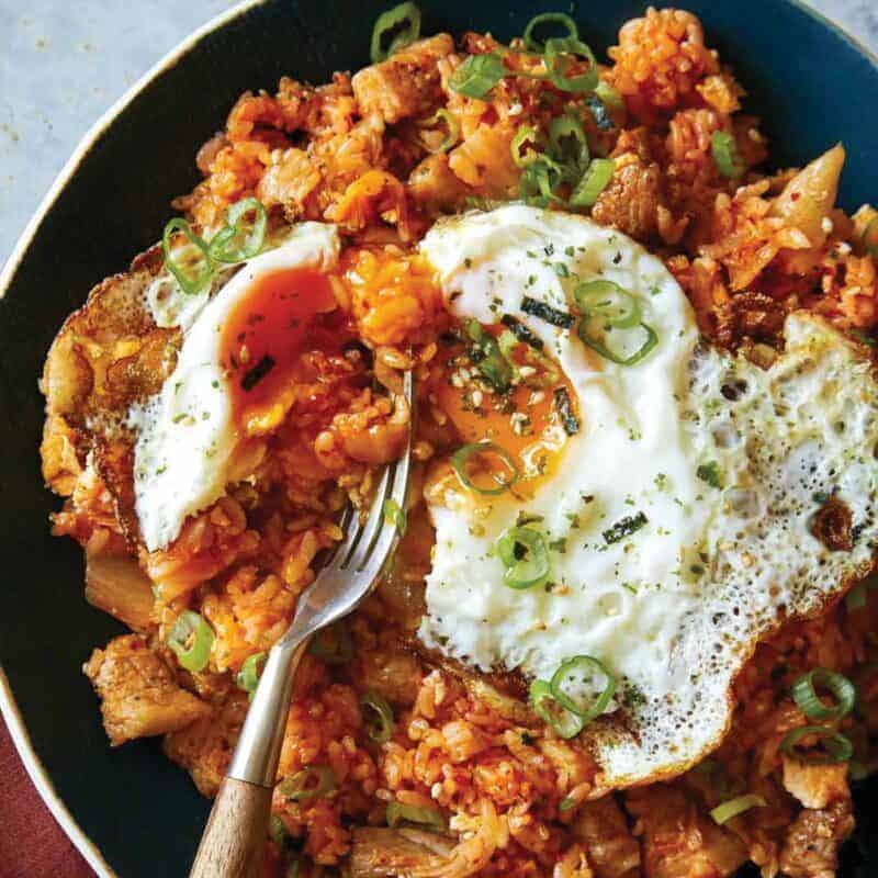 Kimchi Fried Rice recipe in a bowl with a fried egg on top.