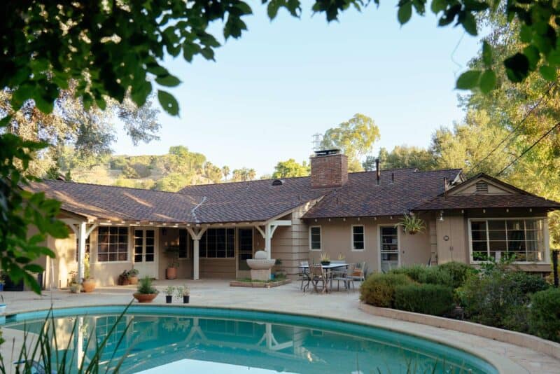 A patio with a pool.