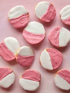 Pink and white frosted Valentine's Day cookies.