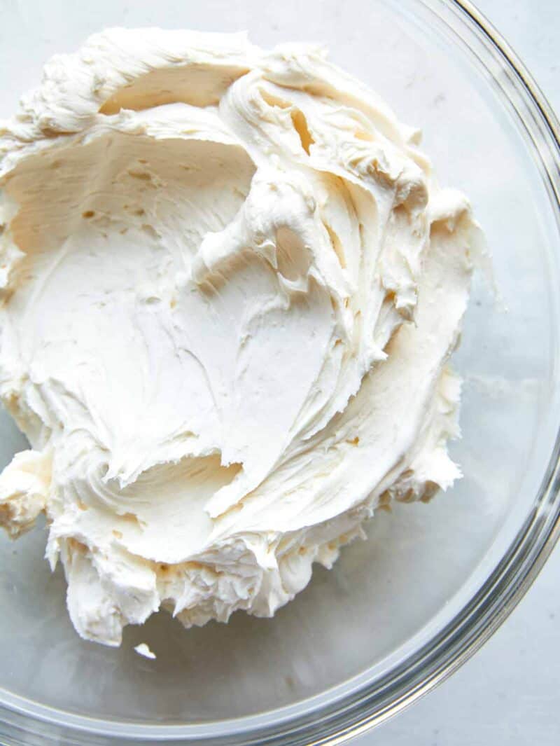 White chocolate frosting in a mixing bowl.