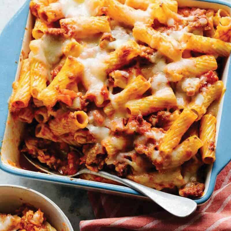 Baked Ziti recipe close up with a scoop taken out. 
