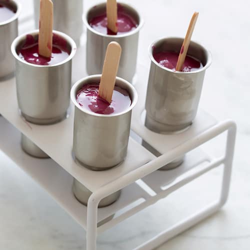 Real fruit bomb pops in stainless steel popsicle mold.