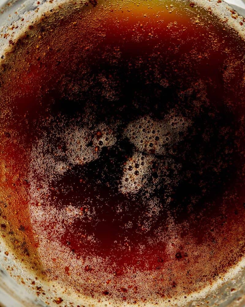 Browned Butter in a glass bowl up close so you can see the color.