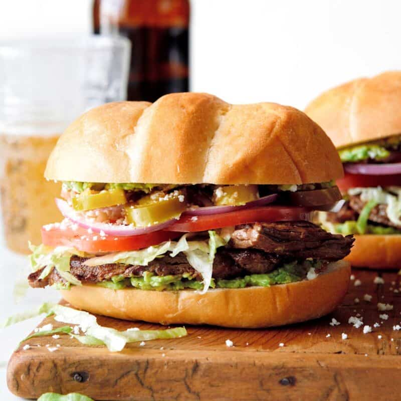 Carne Asada Torta recipe on a cutting board. 