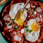 A recipe for Chilaquiles with fried eggs on top.