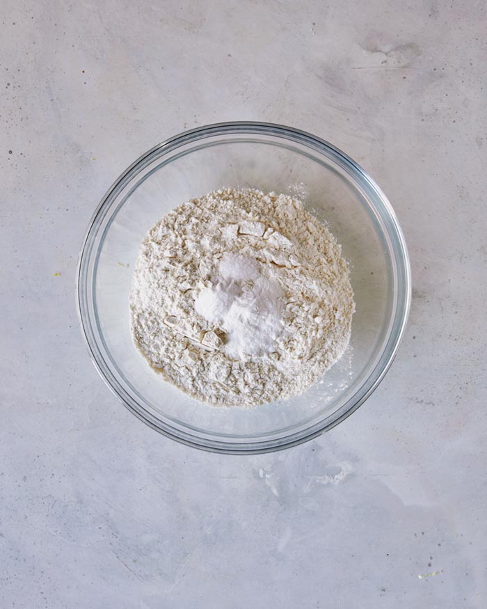 A bowl of dry ingredients for blueberry yogurt cookies.