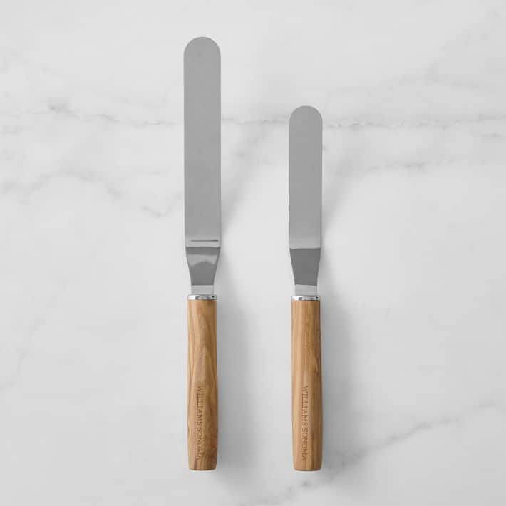 Two different sized wooden handled offset spatulas.