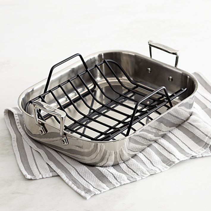 A roasting pan placed on a hand towel.