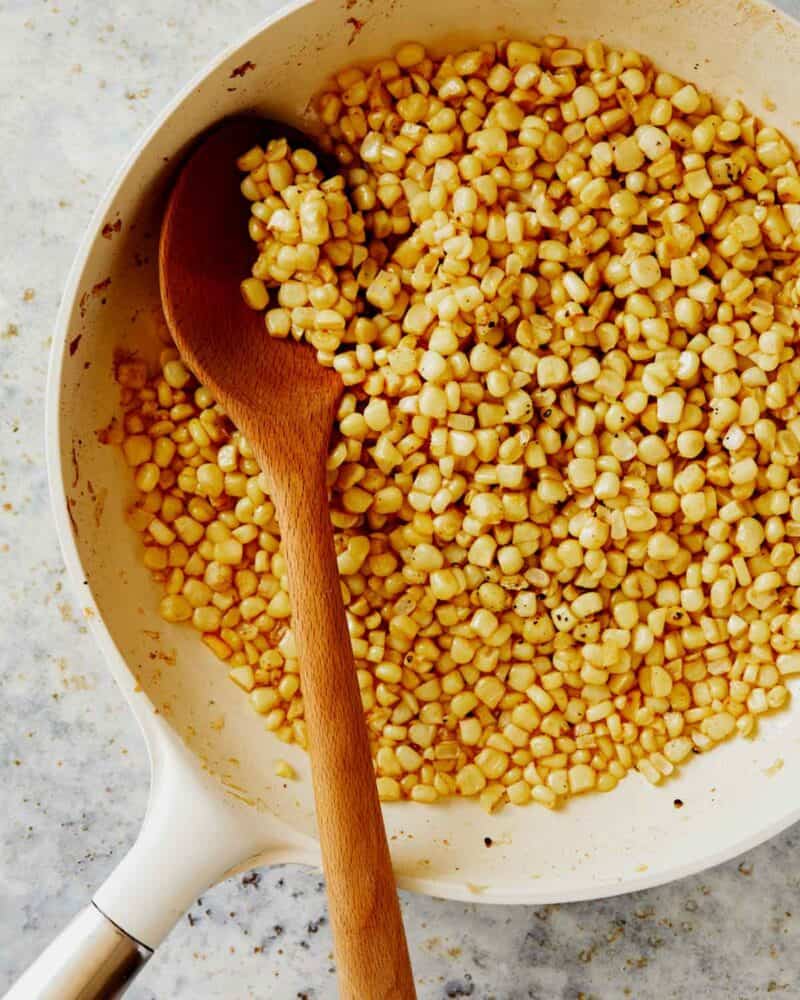 Corn in a skillet seasoned.