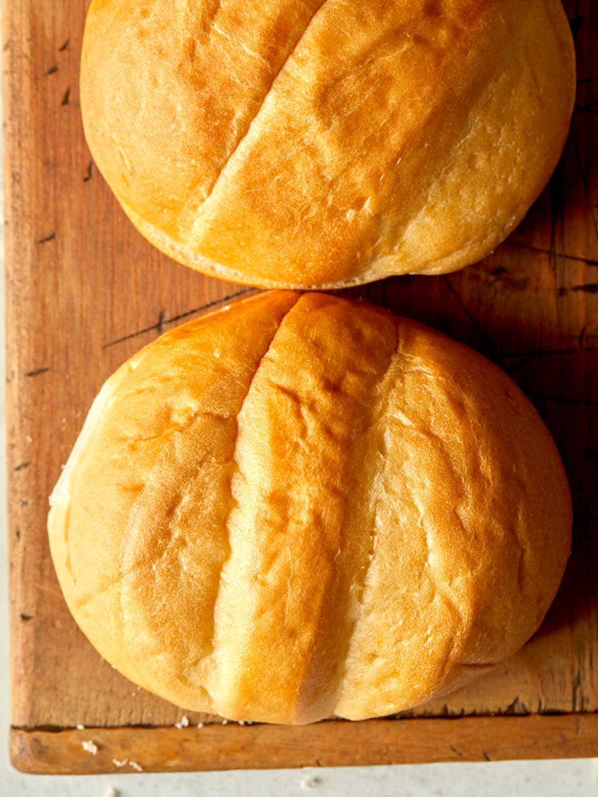 Telera roll on a cutting board for a Carne Asada Torta