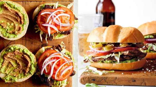 Building a torta on a cutting board.