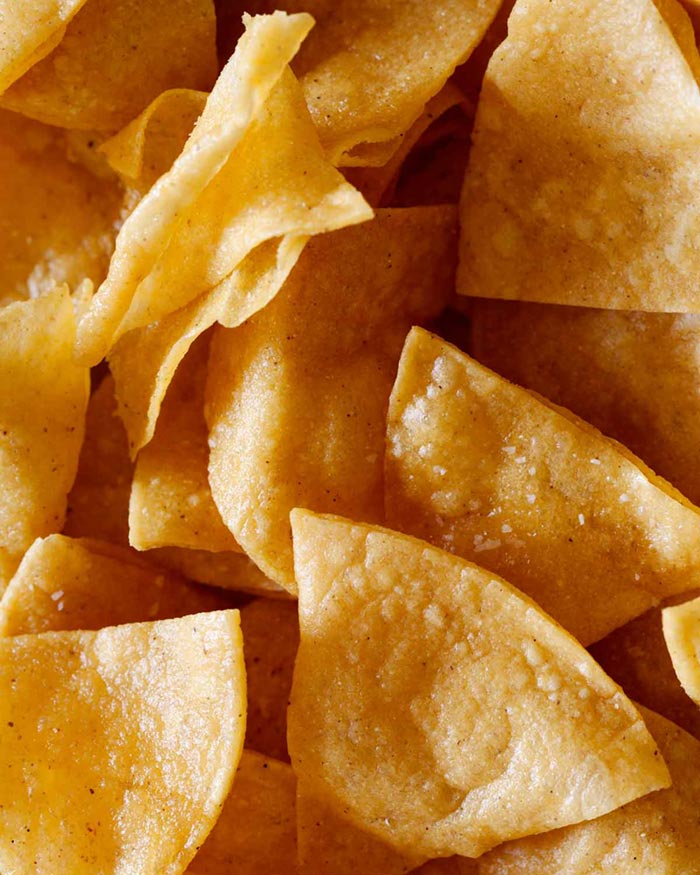 A close up of tortilla chips.