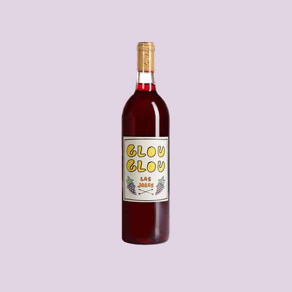 Glou Glou wine bottle on a purple background. 