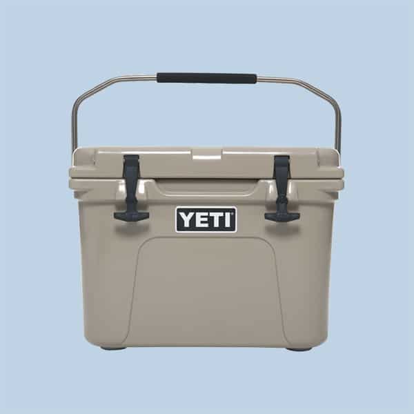 A yeti roadie cooler on a light blue background.