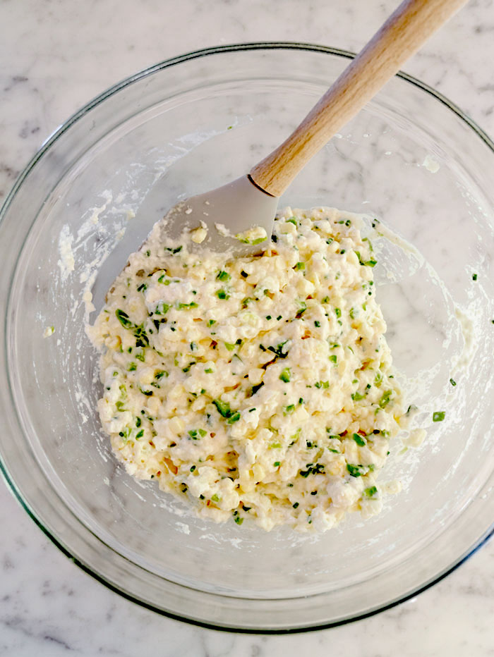 Ingredients folded together to create the batter for the corn cakes.