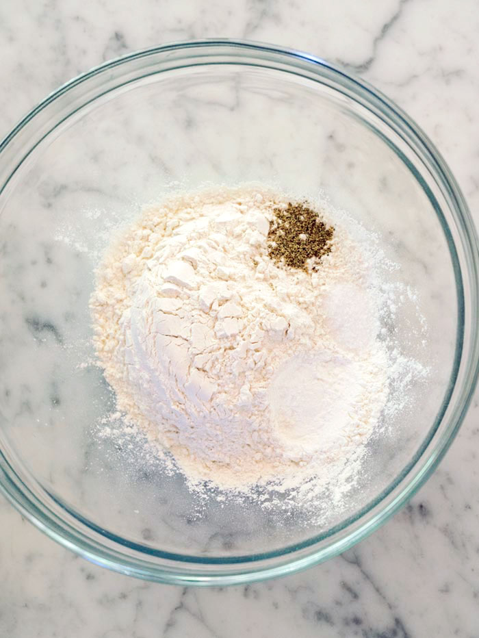 Dry ingredients in a bowl ready to be whisked together.