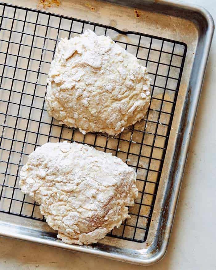 Chicken breaded waiting to be fried.