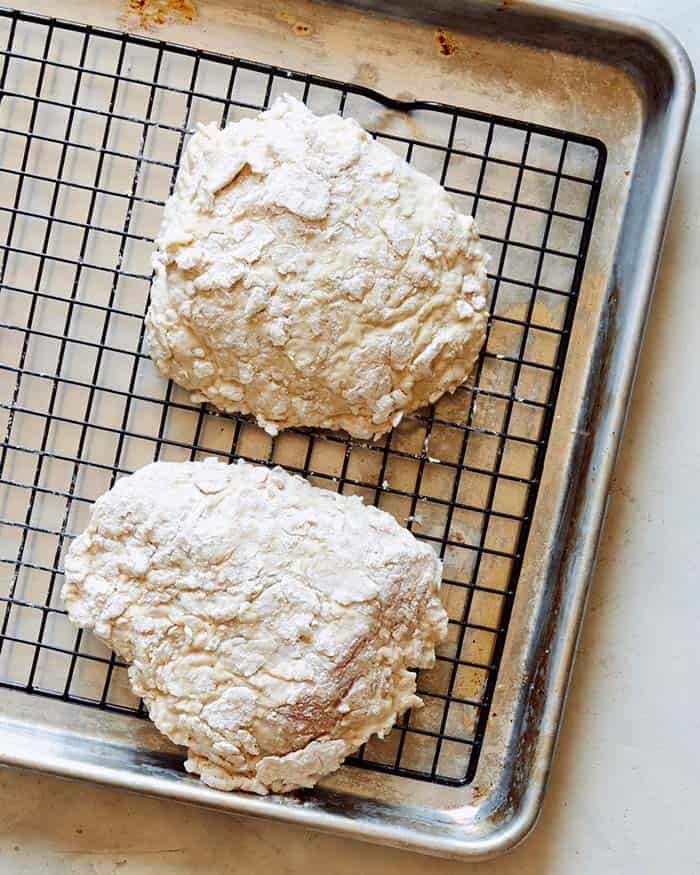 Chicken breaded waiting to be fried. 