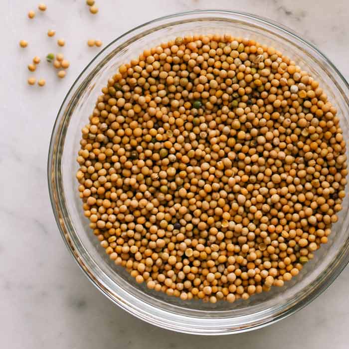 Yellow Mustard seeds overhead which we use for our recipe.
