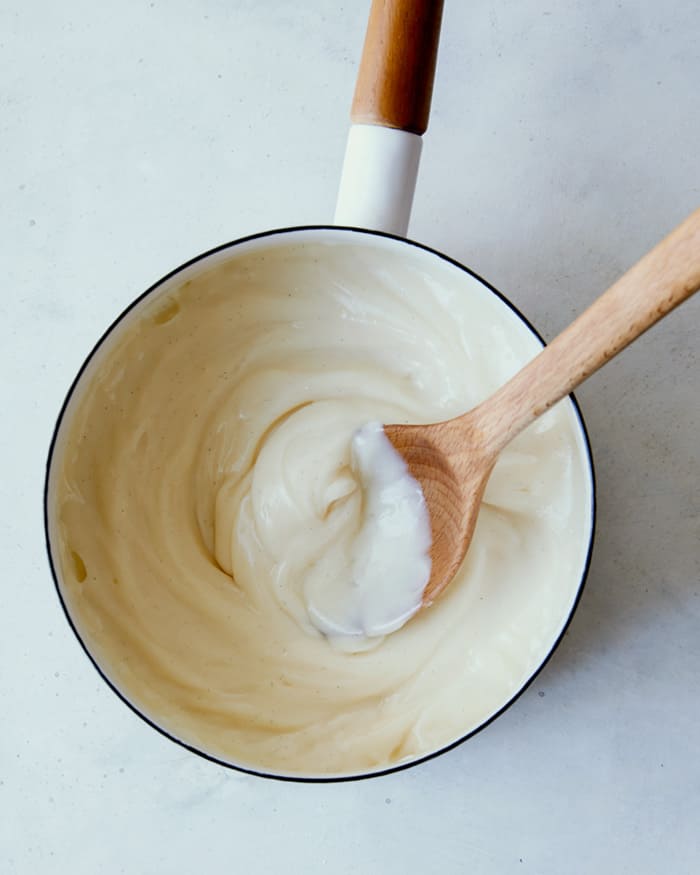 Banana pudding a pot being made.