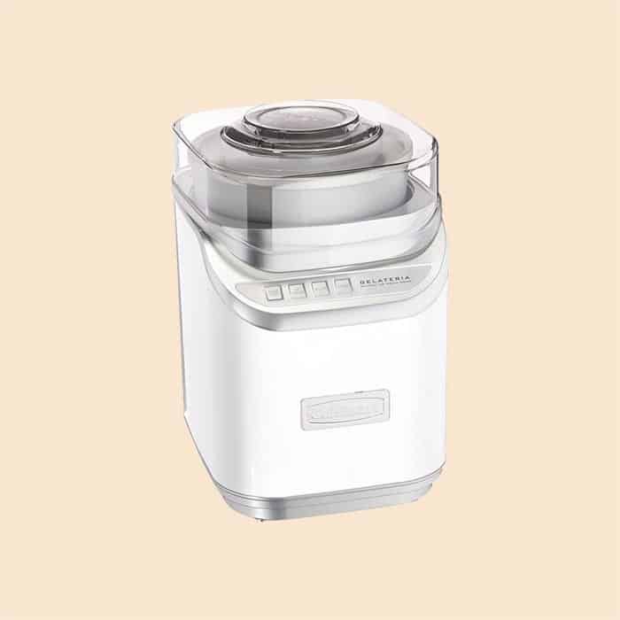 A white cuisinart ice cream maker. 