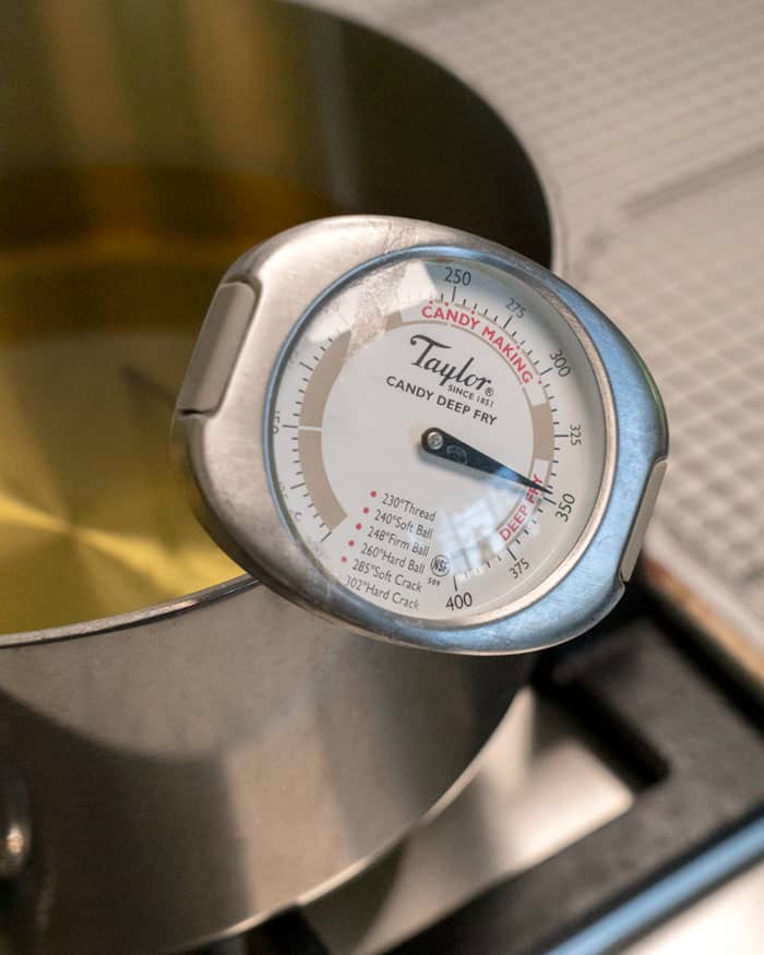 Close up on a thermometer to show the correct oil temperature.