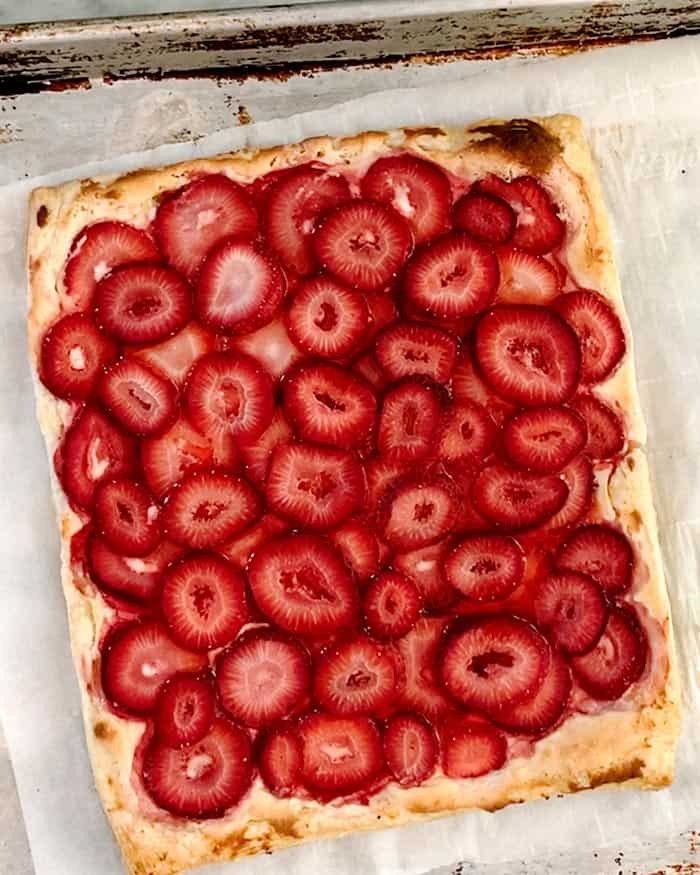 A simple strawberry tart out of the oven baked.