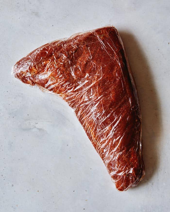 Wrap meat in plastic to refrigerate for at least 3 hours.