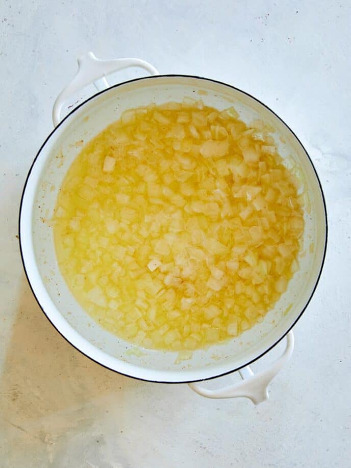 Onions and butter melted in a stock pot.