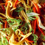 Close up on chow mein noodles so you can see the ingredients.