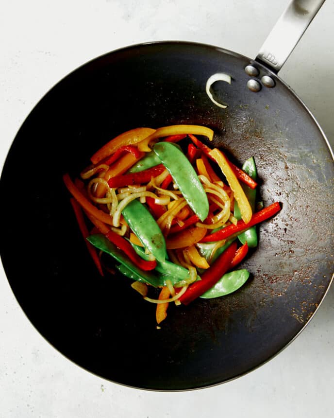 Vegetables cooked in a wok.