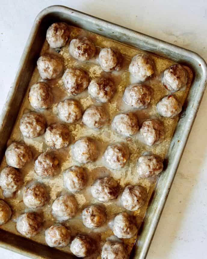 Swedish meatballs baked on a baking sheet. 