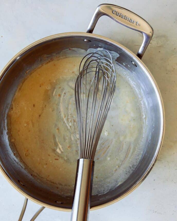 Melted butter and flour in a skillet to make gravy.