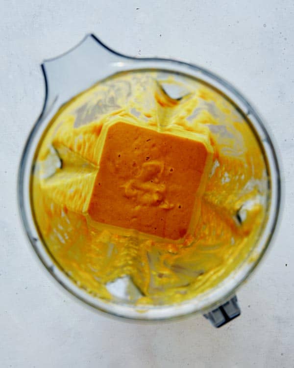 Pumpkin risotto base in a blender for pumpkin risotto recipe.