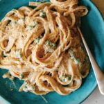 Browned Butter fettuccine alfredo on a plate with a fork.