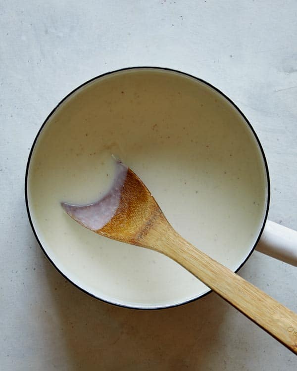 Add milk to the butter and flour.