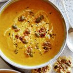 Two bowls of Creamy Pumpkin Soup.