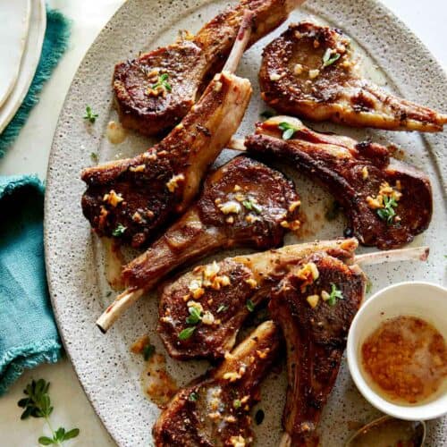 Garlic Butter Lamb Chops on a platter, part of our Christmas Dinner Ideas.