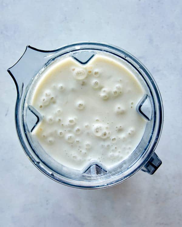 Loaded baked potato soup in a blender.