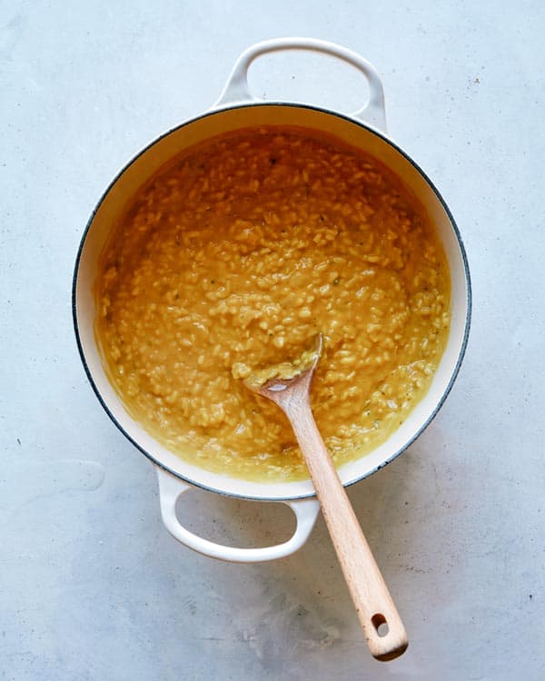 A finished batch of pumpkin risotto in a bit stock pot.