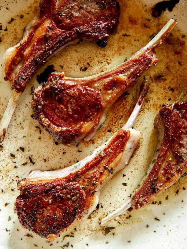 A close up on freshly seared lamb chops so you can see the sear.