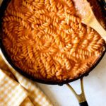 A skillet full of vodka sauce and pasta.