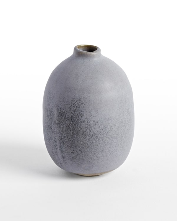 A gray gray hand thrown bud vase. 