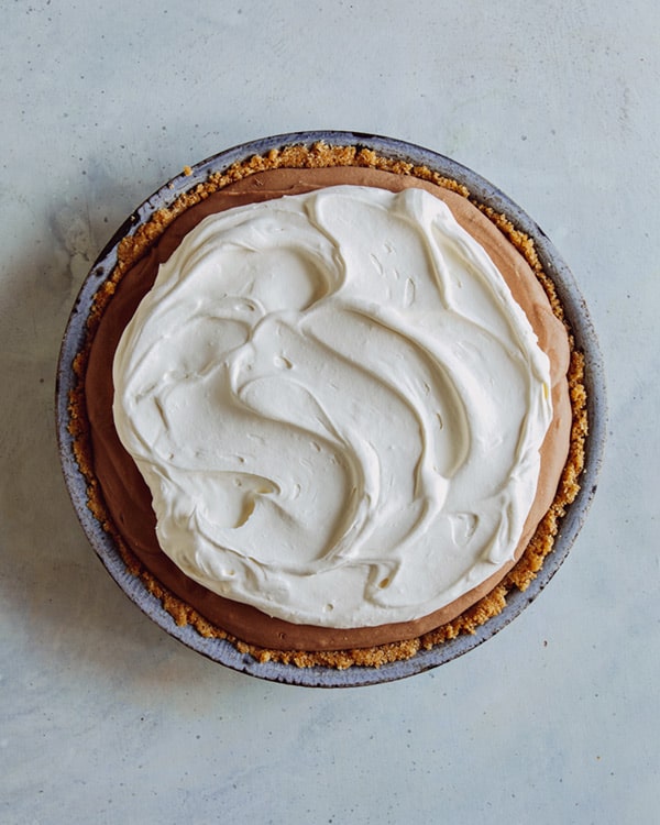 Whipped cream on top of french silk pie.