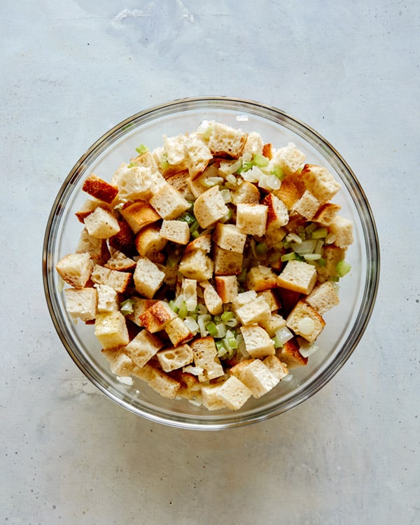 Stuffing mixed together in a glass bowl.