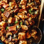 Mushroom and sage stuffing in a baking dish.