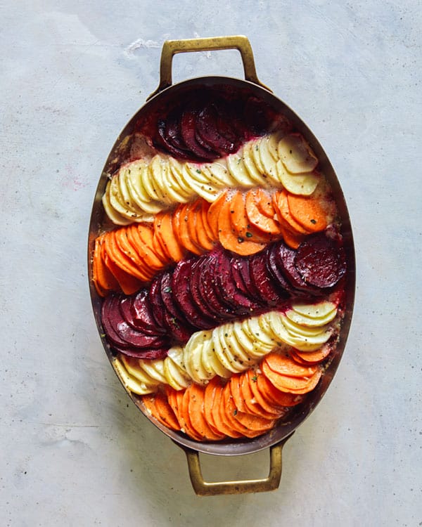 A baking dish with root vegetable gratin.