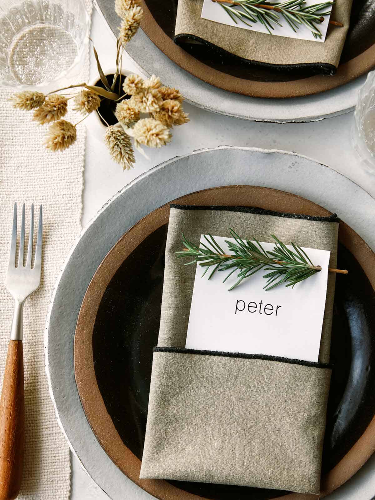 Rosemary Sprig Place Card DIY on a table setting.