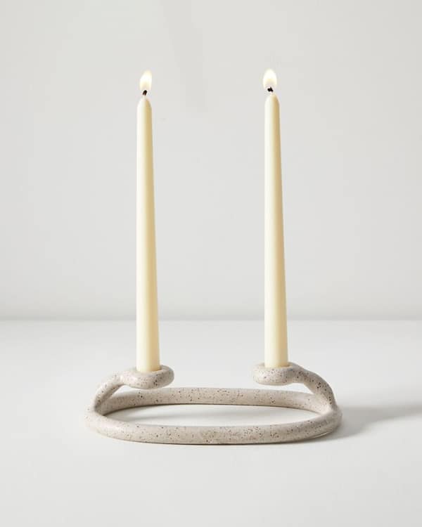 Due candlestick on a white background. 