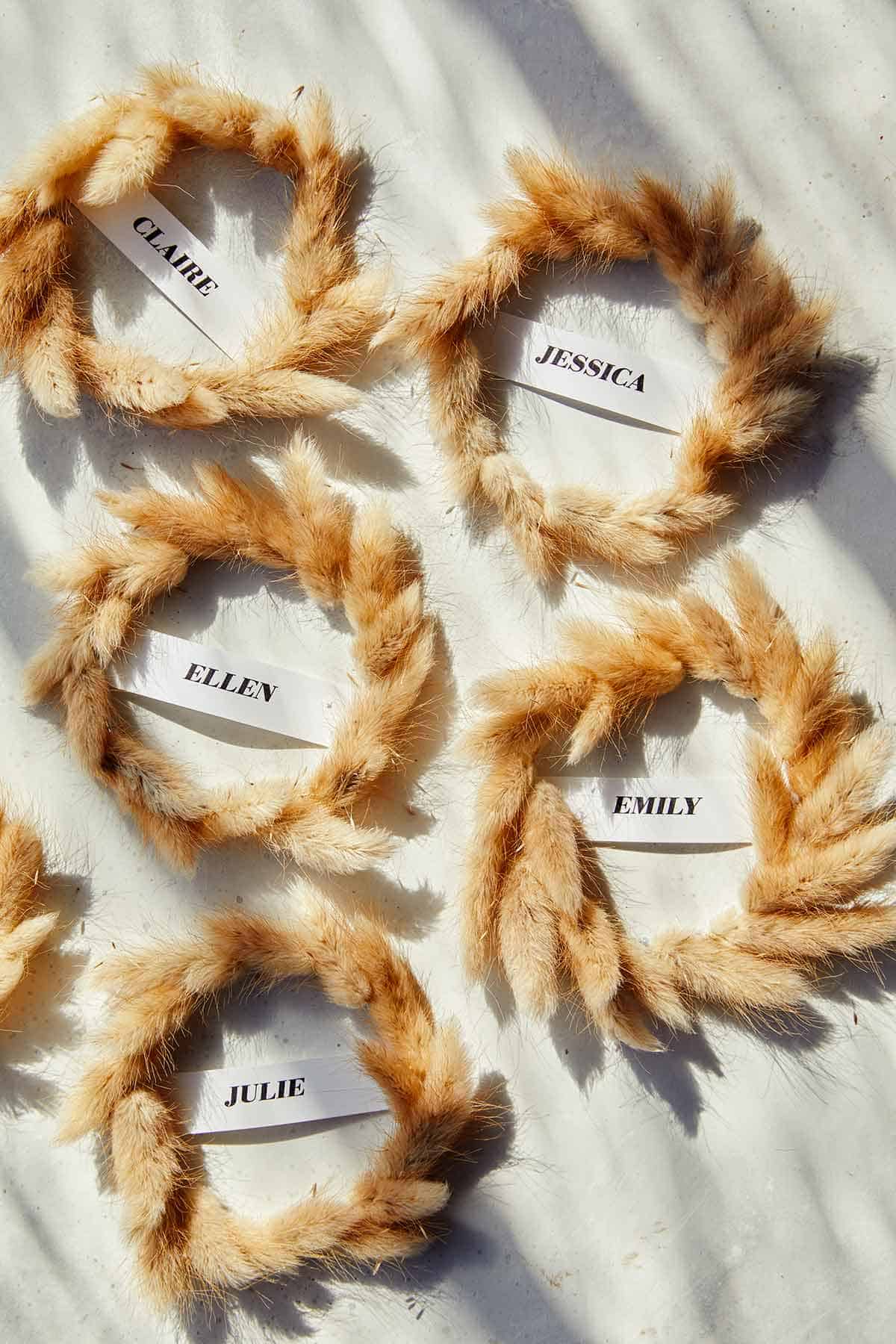 Mini Wreath Place Cards laid out on a surface. 